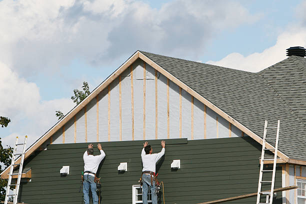 Professional Siding Installation technician working in Troy, PA